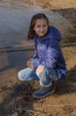 Portrait of beautiful young woman. Plein air photo shoot near river at winter. Portrait of a teenager. Girl 9 years old Royalty Free Stock Photo