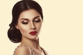 Portrait of a beautiful young woman in retro style. Ideal beauty. Red lips. Royalty Free Stock Photo