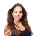 Portrait of a beautiful young woman smiling on isolated white background Royalty Free Stock Photo