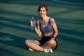 Portrait of a beautiful young woman in sportswear outdoors. Sport fitness model caucasian ethnicity training. Royalty Free Stock Photo