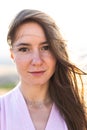 Portrait of a beautiful young woman. Hair fluttering in the wind Royalty Free Stock Photo