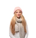 Portrait of beautiful young woman in stylish hat and sweater with scarf on white background. Royalty Free Stock Photo