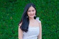 Portrait of Beautiful young woman with summer green park background Royalty Free Stock Photo