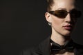 Portrait of Beautiful young woman in sunglasses with butterfly Royalty Free Stock Photo