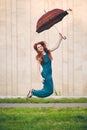 Portrait of beautiful young woman with umbrella Royalty Free Stock Photo