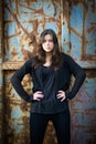 Portrait of a beautiful young woman wearing black casual clothes