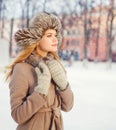 Portrait beautiful young woman wearing a coat and hat Royalty Free Stock Photo