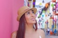 Portrait of beautiful young woman wearing a panama hat at historical center of old town Quito in northern Ecuador in the Royalty Free Stock Photo