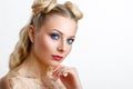 Portrait of a beautiful young woman with white hair, with a bright make-up, beautiful eyes, on a white background Royalty Free Stock Photo