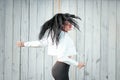 Portrait of a beautiful young woman in a white T-shirt with black hair. joy and laughter degenerate. positive emotions. Life style