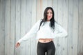 Portrait of a beautiful young woman in a white T-shirt with black hair. joy and laughter degenerate. positive emotions. Life style Royalty Free Stock Photo