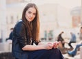 Portrait of a beauty brunette in the city