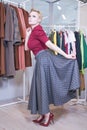 Pretty plus size short hair girl in shopping process