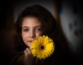 Portrait of beauty Girl with yellow flower Gerber