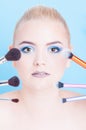 Portrait of beauty make-up with different kinds of brushes Royalty Free Stock Photo