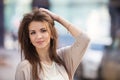 Portrait of beauty woman with perfect smile walking on the street and looking at camera Royalty Free Stock Photo