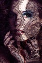 portrait of beauty young woman through lace close up mistery mak Royalty Free Stock Photo