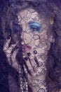 portrait of beauty young woman through lace close up mistery mak Royalty Free Stock Photo