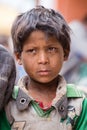 Portrait beggar young boy on the street in Leh, Ladakh. India Royalty Free Stock Photo