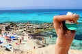 Portrait from behind of a little kid watching the amazing Es calo d'es mort beach Royalty Free Stock Photo