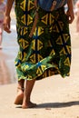 Behind of woman walking barefoot at the beach Royalty Free Stock Photo