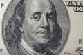 Portrait of Ben Franklin on the US 100 dollar bill in macro. Benjamin Franklin on hundred dollar American banknote Royalty Free Stock Photo