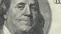 Portrait Benjamin Franklin on USA money One hundred dollars banknote pile