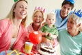 Portrait, big family or cake to laugh at birthday, party or event to care, love or bonding together. Grandma, papa or Royalty Free Stock Photo