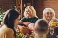 Portrait of big family celebrating thanks giving eat share stuffed turkey served dinner chatting house living room Royalty Free Stock Photo