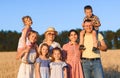 Portrait of big family in field