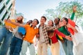 Portrait of a big group of smiling multiracial teenagers having fun outdoors. Cherful young people laughing together on Royalty Free Stock Photo