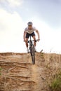 Portrait, bike and man off road cycling on dirt track for sports, competition or outdoor hobby. Fitness, nature and race Royalty Free Stock Photo