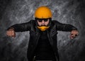 Biker man in motorcycle helmet and black leather jacket Royalty Free Stock Photo