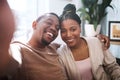 Portrait, black couple and selfie in living room, happy and relax while bonding, embrace and smile in their home. Face Royalty Free Stock Photo