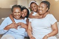 Portrait of black family, mom and children smile with grandma on sofa of modern African living room with love, happiness Royalty Free Stock Photo