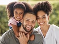 Portrait of black family, mom, dad and girl having fun and smiling. Mother and father posing with daughter in the park Royalty Free Stock Photo