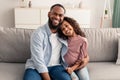 Portrait of black father and daughter hugging Royalty Free Stock Photo