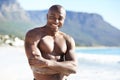 Portrait of black man on beach, sun and smile in sunshine, arms crossed and outdoor island travel. Sea, mountain and Royalty Free Stock Photo