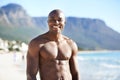 Portrait of black man on beach, vacation and smile with nature, sunshine and outdoor island travel. Sea, mountain and Royalty Free Stock Photo