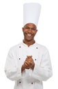 Portrait, black man and happy chef in studio isolated on white background. Face, cooking professional and smile of young Royalty Free Stock Photo