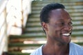 Portrait of a black man laughing and looking away Royalty Free Stock Photo