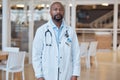 Portrait, black man and serious doctor in hospital for healthcare. African medical professional, face and surgeon Royalty Free Stock Photo