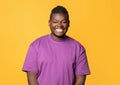 Portrait Of Black Man Smiling To Camera Posing In Studio Royalty Free Stock Photo