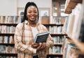 Portrait, black woman and library with book, knowledge and relax with free time. Nigerian female, student smile and Royalty Free Stock Photo