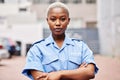 Portrait, black woman and security guard with arms crossed for surveillance service, safety and urban watch. Law Royalty Free Stock Photo