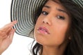 Portrait of black woman in white bikini with straw hat Royalty Free Stock Photo