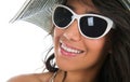 Portrait of black woman in white bikini with straw hat Royalty Free Stock Photo