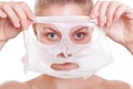 Portrait blond girl in facial mask. Beauty and skin care. Royalty Free Stock Photo