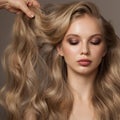 Portrait of blonde girl with long beautiful wavy hair Royalty Free Stock Photo