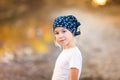 The portrait of blonde girl with two braids